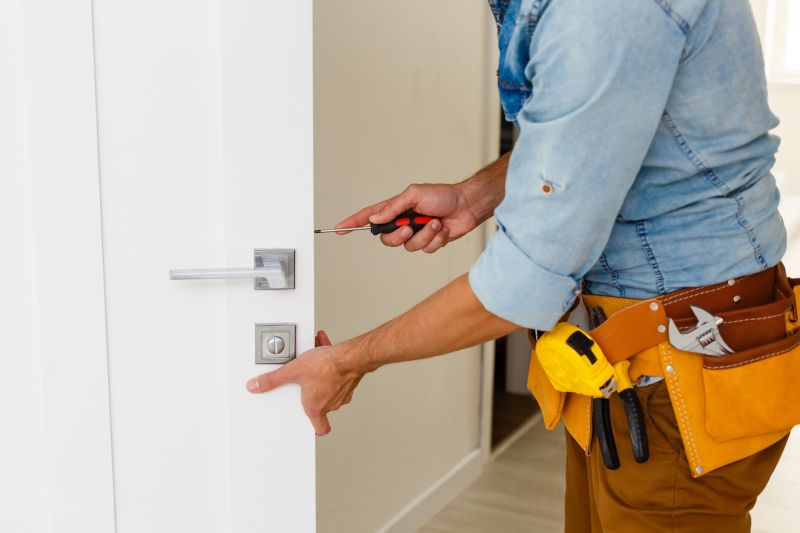 Handyman Repairing a Door